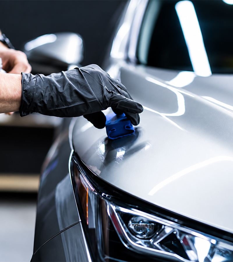 Ceramic coating applied to a silver car bonnet